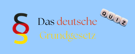 Ein Paragraf-Zeichen und daneben Schrift "Das deutsche Grundgesetz" in Farben Schwarz-Rot-Gold 